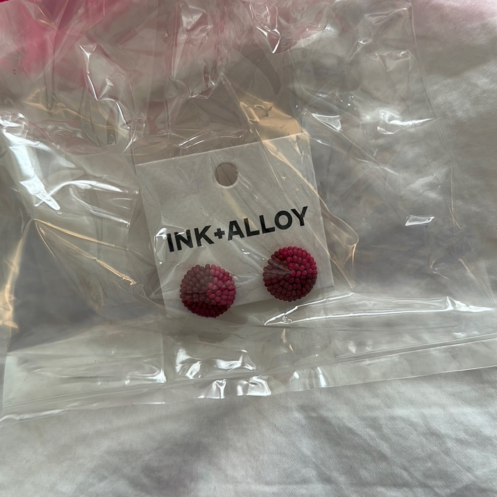 Brand new in gift bag Ink and Alloy earrings. Pink and Red beaded.